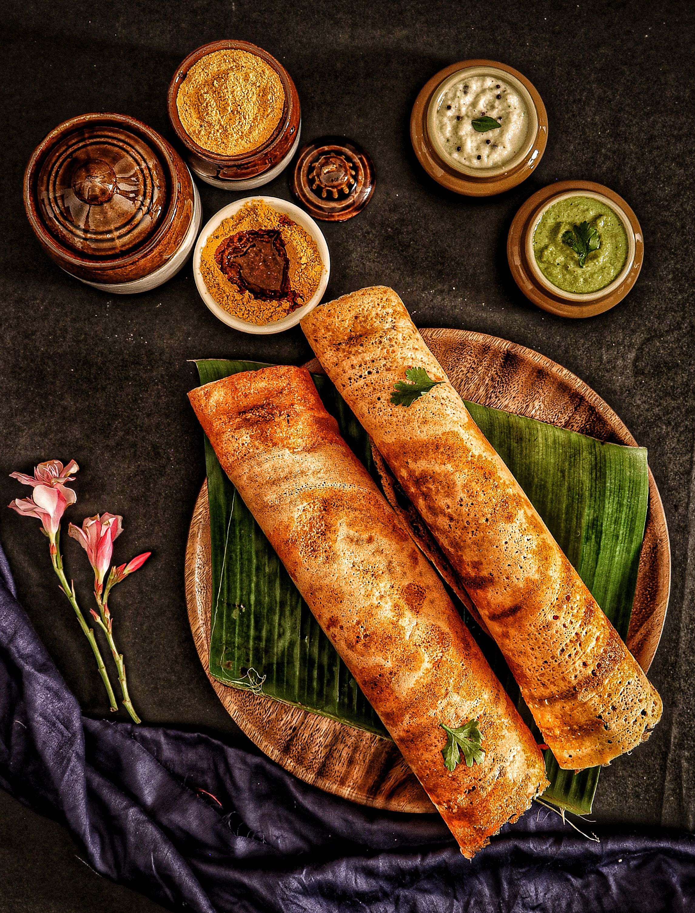 Millets and pulses arranged in a colorful flat-lay collage